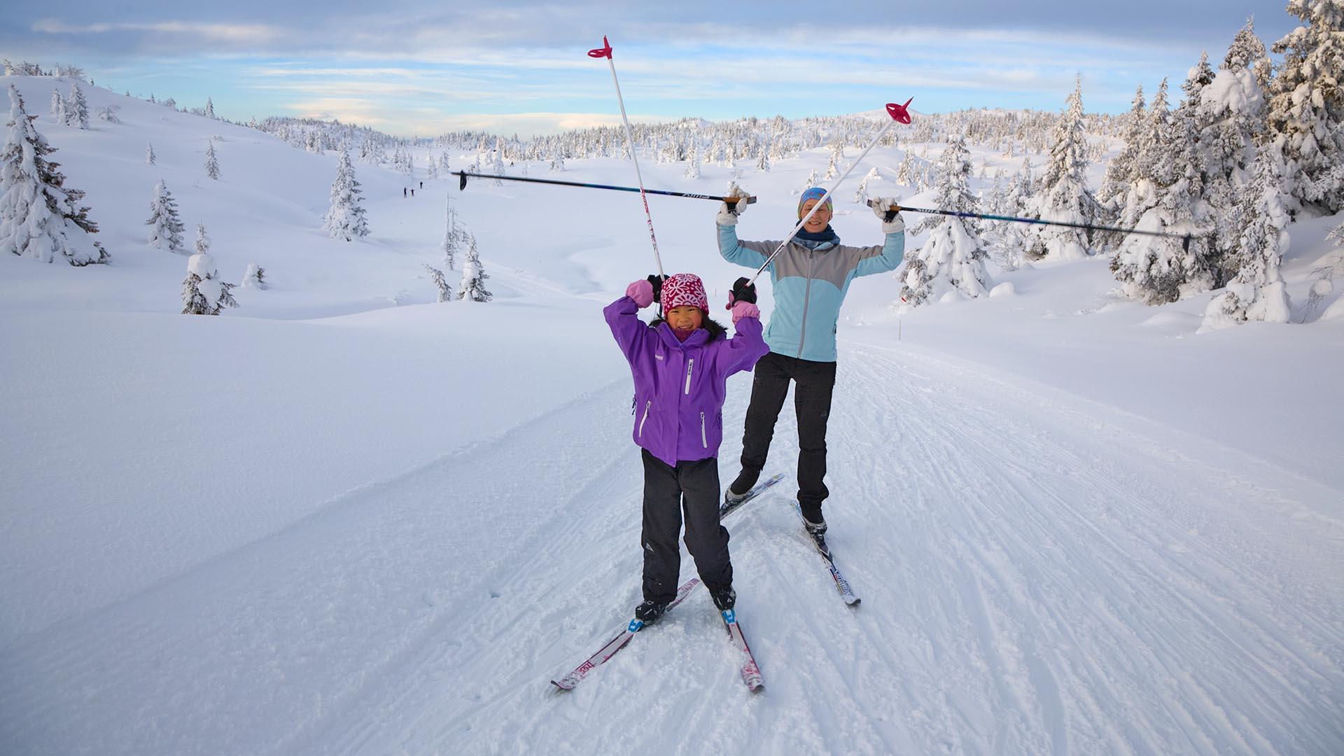Mother and child on cross country skis