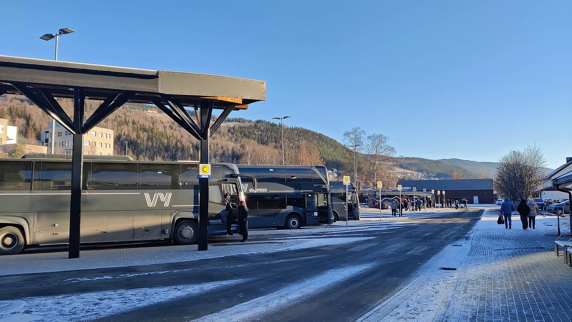bus terminal with buses a sunny winter day
