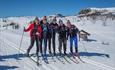 Glade damer på ski under Rjupesleppet