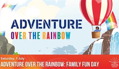 The text reads Adventure Over the Rainbow depicting a hot air balloon floating past a waterfall and rainbow.
