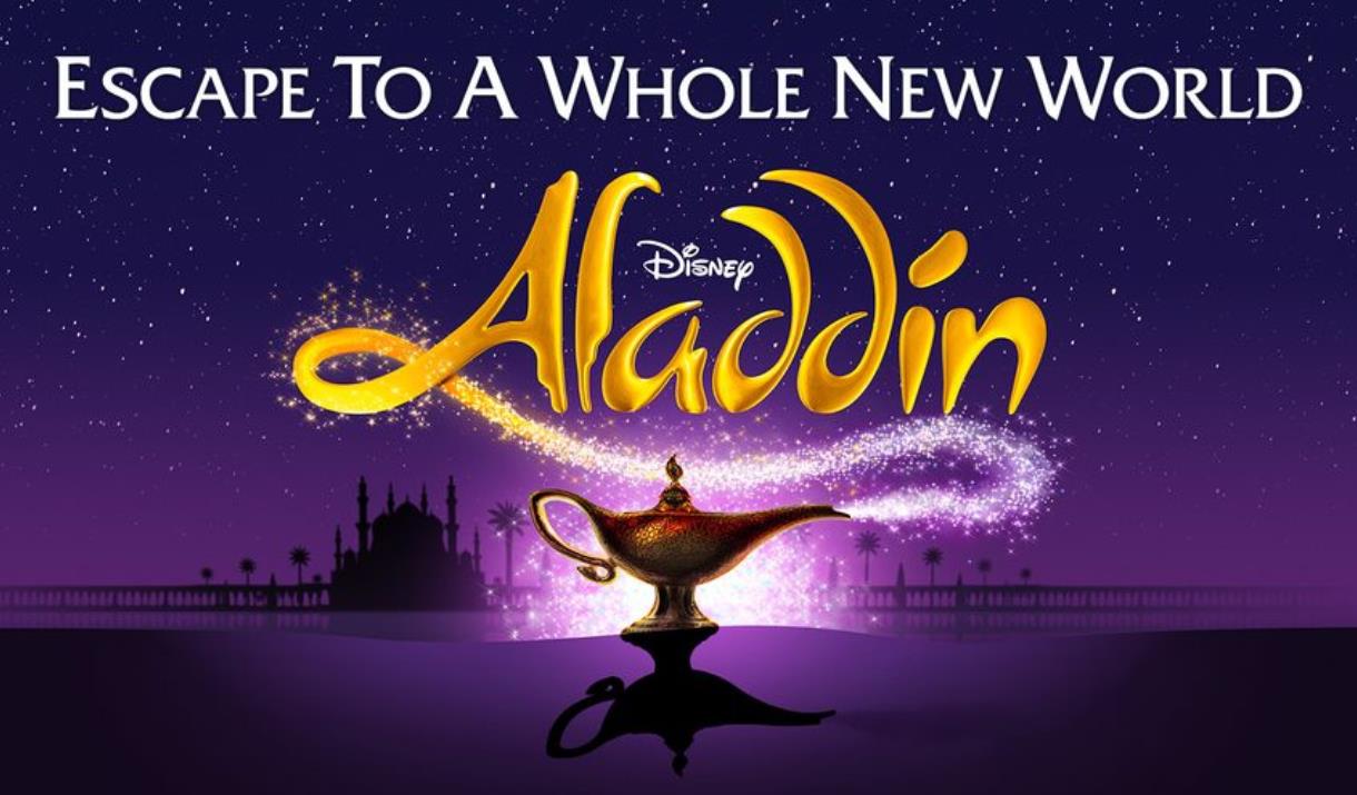 A poster advertising the show, with the word "Aladdin" coming out of the magic lamp