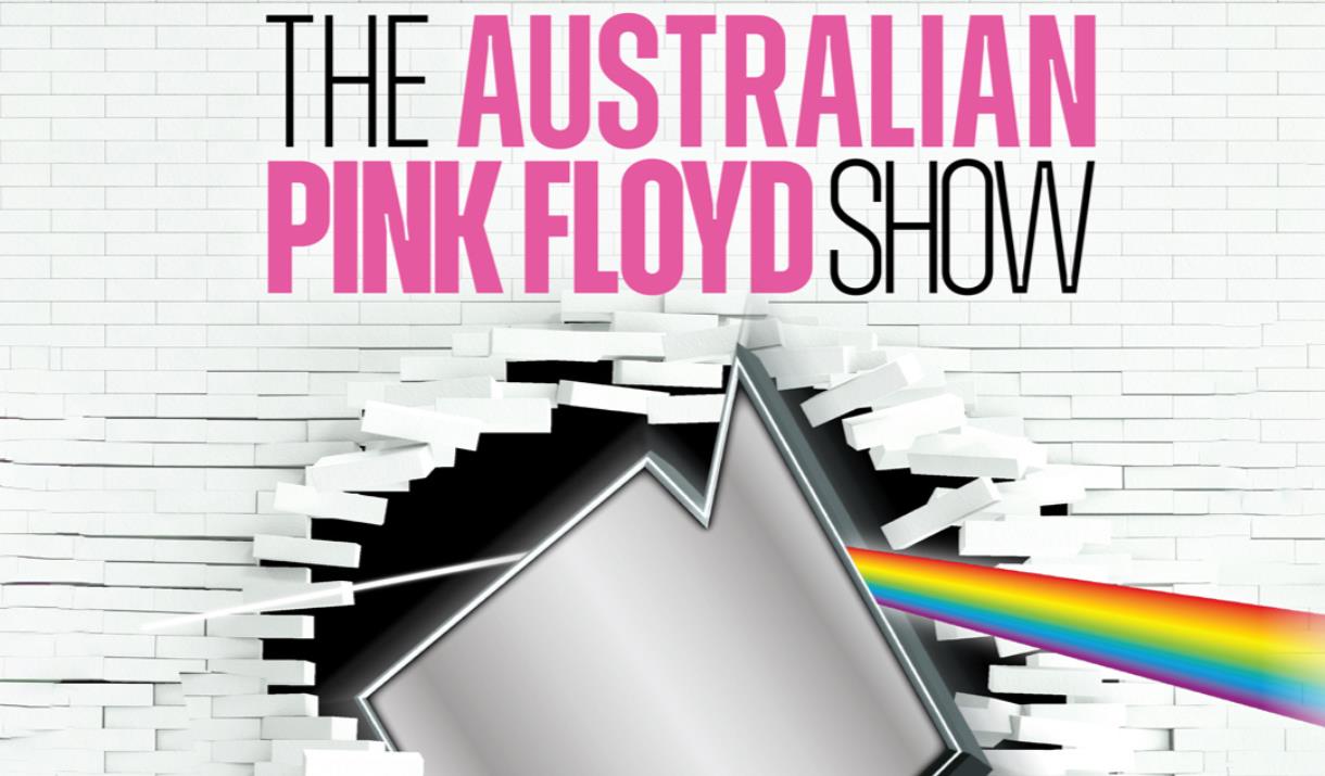 A poster advertising the concert, showing a hammer braking through a wall of white bricks, and a rainbow