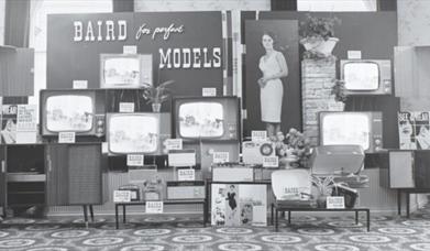 A display of old tvs