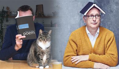 A picture of two men, and a cat. One man is reading a book of poetry, the other is sitting with a book on his head.