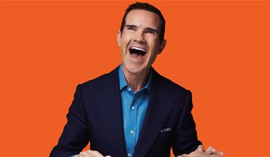 A picture of comedian Jimmy Carr, laughing