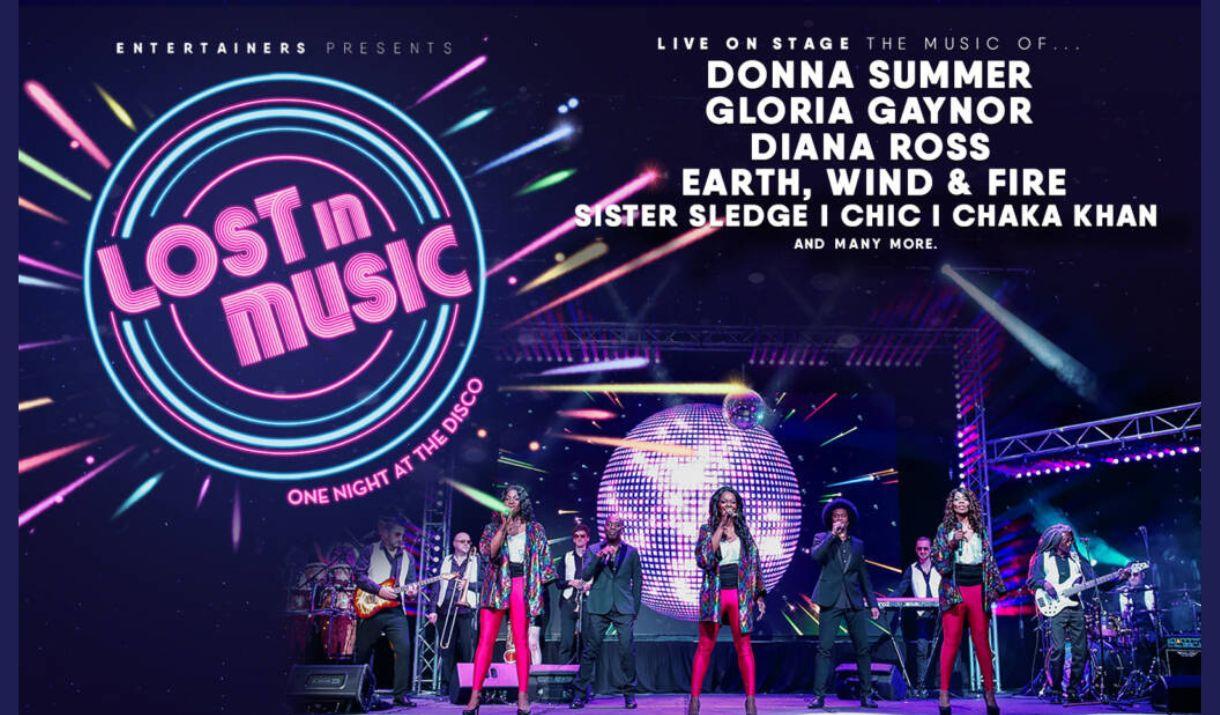 A poster advertising the show, with a band on a stage, in front of a giant glitter ball