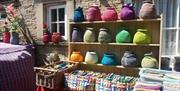 Knitted pots at the Saltaire Festival Open Gardens.