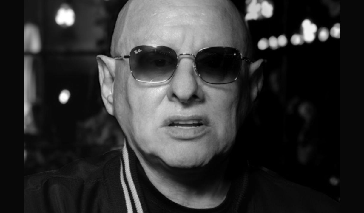 A black and white close-up photograph of musician Shaun Ryder