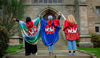 3 women wearing capes Image by Karol Wyszynski