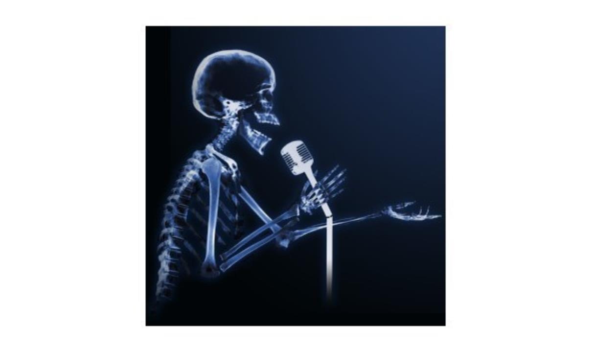 Skeleton with a microphone.