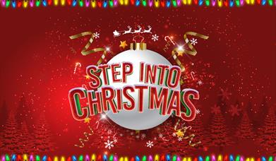 A poster advertising the show, with the words "Step Into Christmas" in front of a giant silver bauble. 
