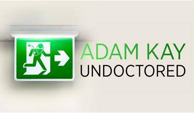 An exit sign, with the picture of the man wearing a stethoscope