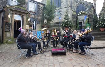 Brass Band playing at the top of Main Street Haworth.