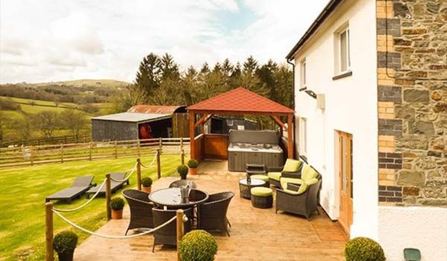 Outdoor seating and decking area at Cwmcelyn self catering Llandrindod Wells