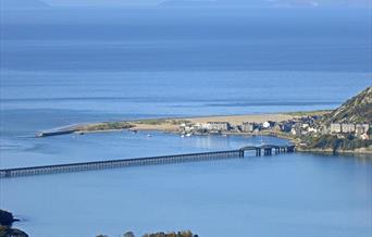 Barmouth in Southern Snowdonia is a great location for Mountain, Sand and Sea. Extensive sandy beach with attractions, water sports and boat trips.