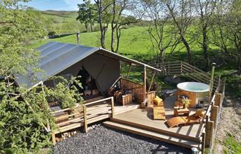 Relax and unwind in your private outdoor sundeck and hot tub