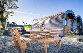 Lets Glamp Retro Luxury Glamping in West Wales - Madonna from the picnic table