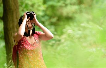 Woman birdwatching