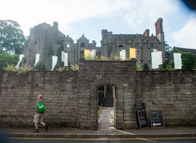 The stone front of Hay Castle in Hay-on-Wye