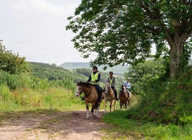 Horse riders on the hills of Bannau Brycheiniog