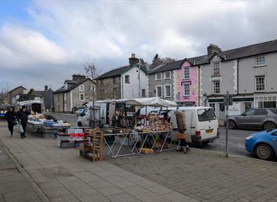 Market stalls along the main street in Machynlleth on a winter market day