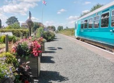 Train pulled in at a platform in Mid-Wales