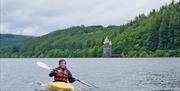 water sports at lake Vyrnwy in front of the straining tower