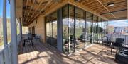 Outdoor seating at Hafan yr Afon Newtown cafe and visitor centre