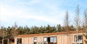 Sleeps upto 8 guests, with private outdoor hot tub