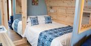 Tŷ Twt Teifi bedroom in glamping pod with hot tub Tregaron Ceredigion