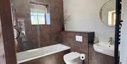 Stylish bathroom in the Carthouse cottage at Bythynnod Pengwernydd Cottages near Devil's Bridge