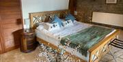 Master bedroom in Great House Farmhouse, luxury self catering