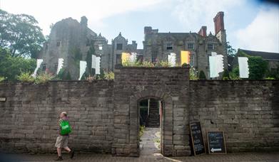 The stone front of Hay Castle in Hay-on-Wye