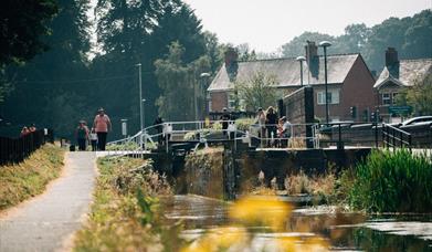 The towpath beside a lock on the Montgomery Canal in Welshpool