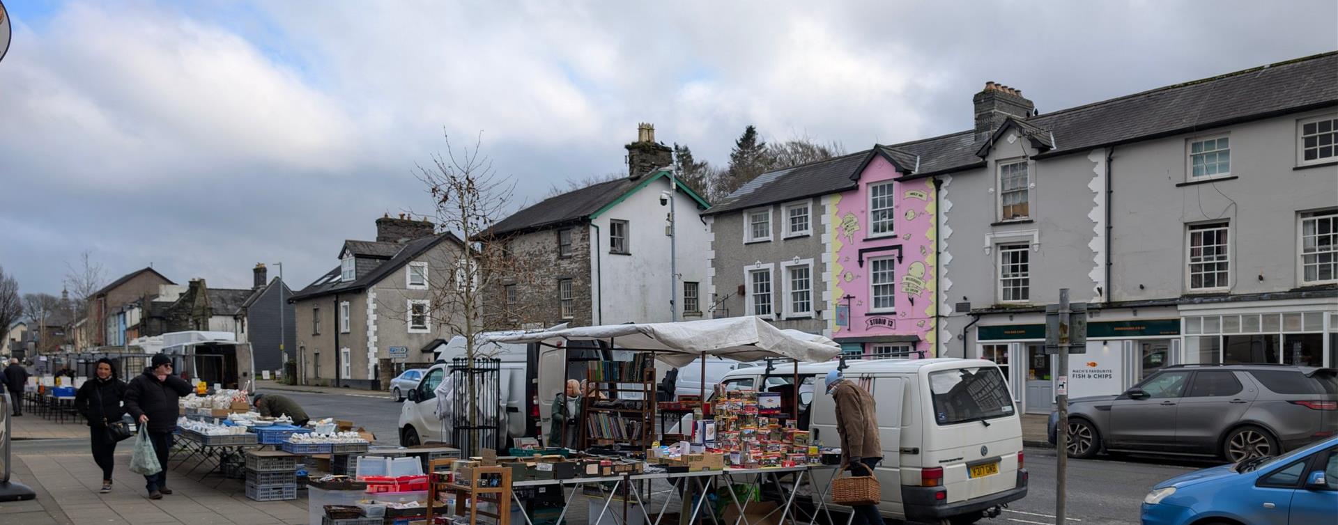 Market stalls along the main street in Machynlleth on a winter market day