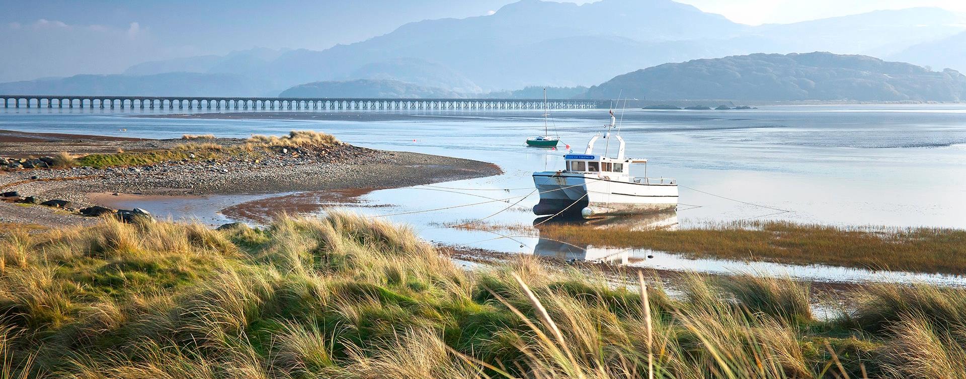 The Mawddach estuary from Fairbourne in autumn, looking towards Barmouth Bridge and the hills of Southern Eryri