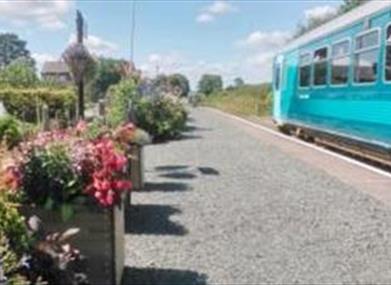 A train on the Heart of Wales Line in Mid Wales