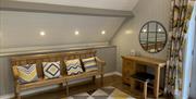 Hilltops Brecon Holiday Cottages - The Longhouse main bedroom with dressing table, separate dressing area and en-suite