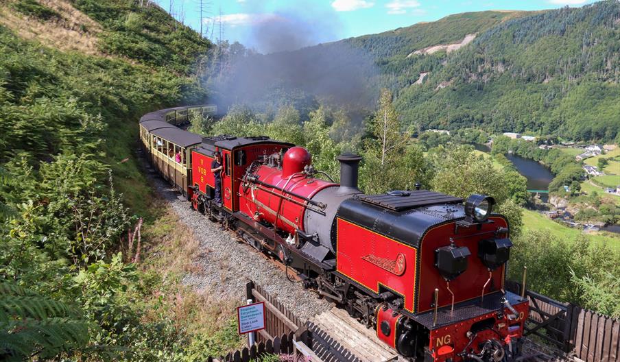 A red engine no.60 'Drakensberg' steaming above the Rheidol Valley A red engine no.60 'Drakensberg' steaming above the Rheidol Valley