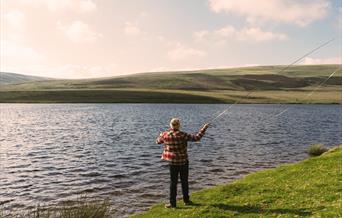 Fishing in the Elan Valley on a summers day.