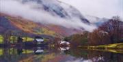 The Pen-y-Bont Hotel as seen from across Talyllyn Lake. The mist was just clearing after heavy rain.