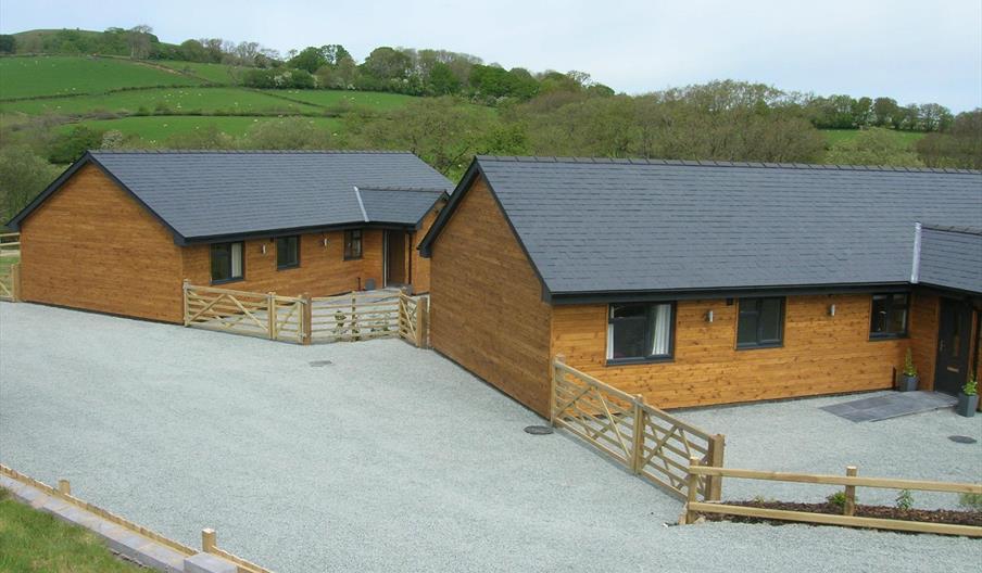 Entrance to both Lodges which are brand new for 2019 and graded 5 star by Visit Wales.  These luxury lodges will sleep up to 6 guests each in 3 bedroo