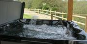 Both Lodges have under cover hot tubs that can be enjoyed even on a rainy day as the views are fantastic.