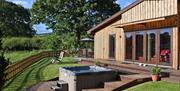 Private hot tub and garden with dining patio and sun loungers