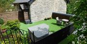 The Loft garden deck with hot tub.