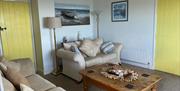 Rola farmhouse living room at Rola Cottages near Fairbourne, Tywyn, and Barmouth