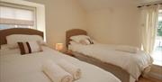 Bedroom 2 Ensuite  Tylau Cotages Either 2 Single Beds or a Super King Bed