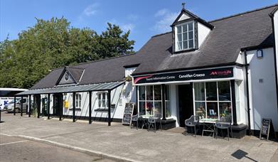 Chepstow Tourist Information Centre exterior of building next to carpark and chepstow castle