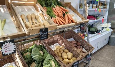 Raglan Farm shop with fresh vegetables and fridge