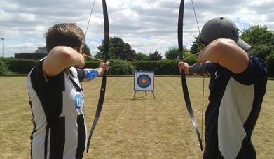 2 people shooting bows